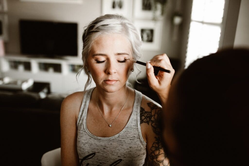 Eyeliner being applied to bride in St. Catharines as she prepares to get married.