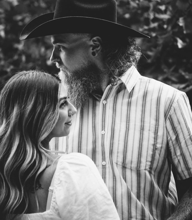 artistic black and white of young engaged couple