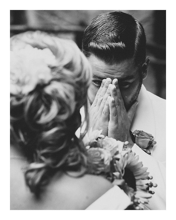 Groom crying in Niagara Falls as he sees his bride for the first time.